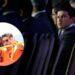 Audience in Formal Attire Sits at a Conference; Circular Inset Shows Orange-shirt Volunteers Raising Hands Behind a Railing. for Accessibility: Conveys Event Setting and the Inset Action of Volunteers Gesturing. - Especies Políticas